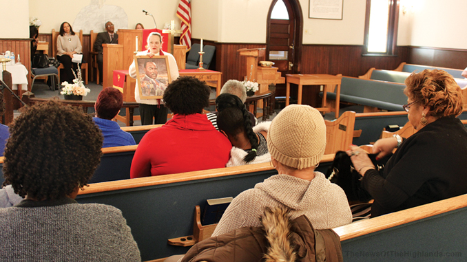 Congregation listens to speaker discussing MLK
