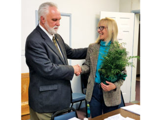 Village Trustee Barbara 'Charlie' Murphy attended her final meeting on Monday.