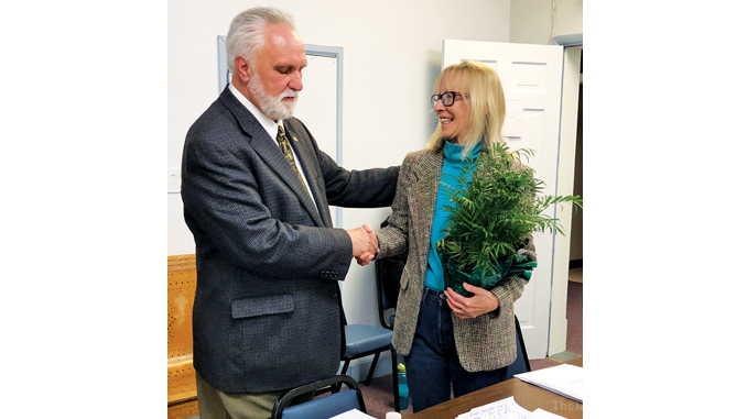 Village Trustee Barbara 'Charlie' Murphy attended her final meeting on Monday.